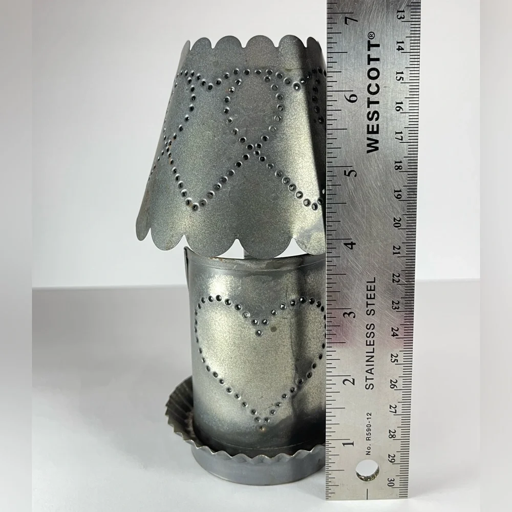 Vintage punched tin tea light candle holder